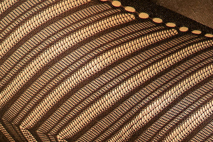 Close-up of black sheer diagonal stripe open-knit fabric on seamless crop top and leggings set